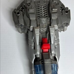 Silver and Red Transformer Toy